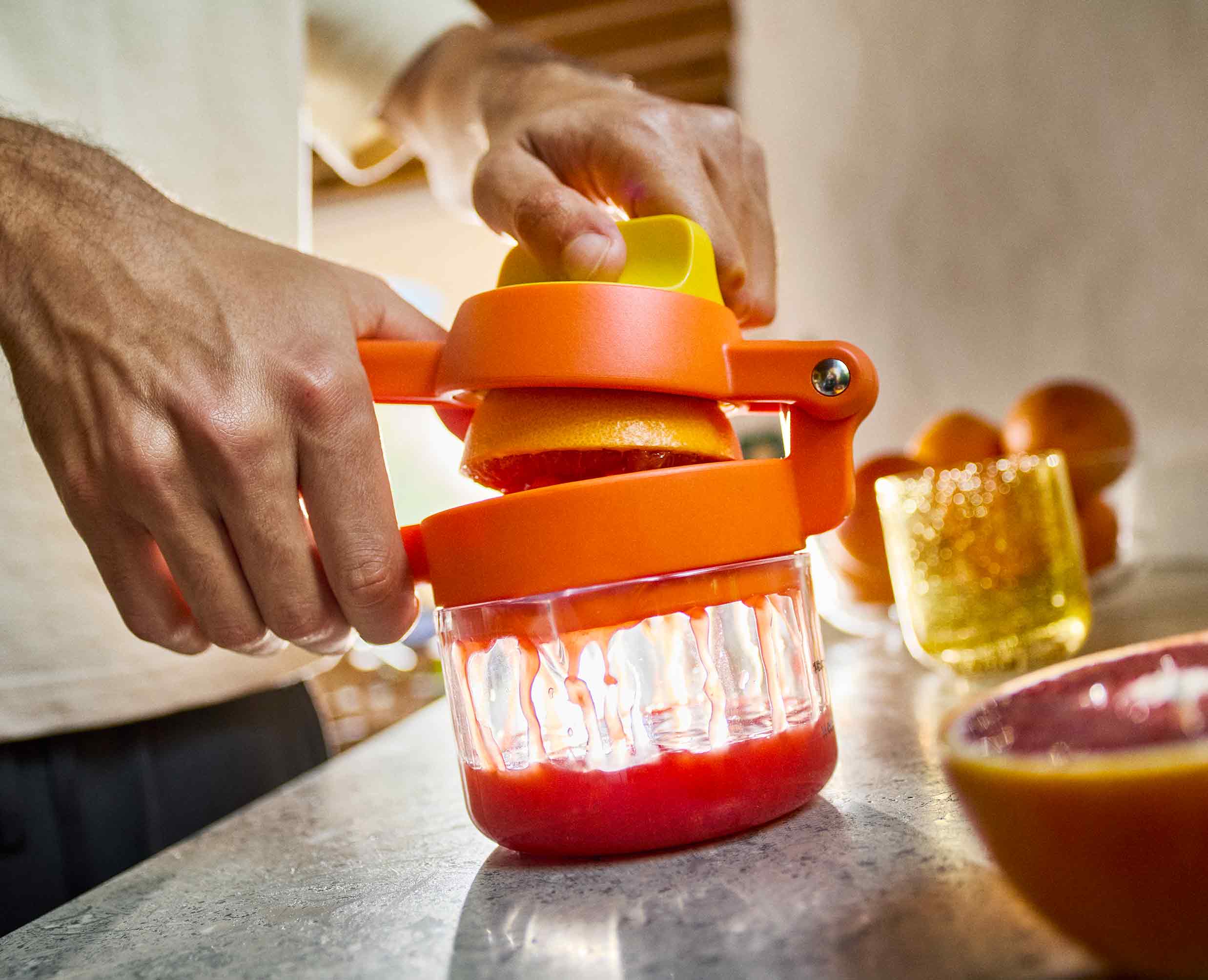 JuiceMax™ Plus Dual-Action Orange Citrus Press with Measuring Cup - Image 3